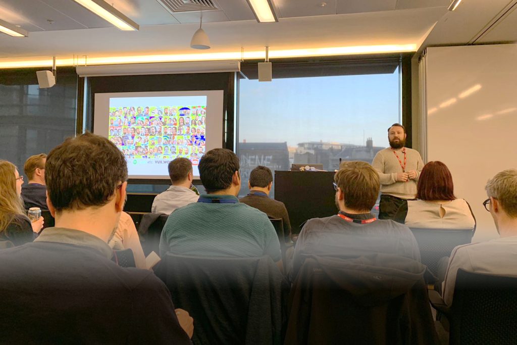 Kane Simms of VUX World presenting at the MUXL meet up at Amazon HQ London